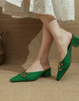 CD Gold Buckled Green Mule Heels