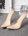 Nude pointed-toe stiletto heels with clear transparent side panels and clear heel