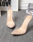 Nude pointed-toe stiletto heels with clear transparent side panels and clear heel