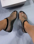 Black mesh shoes with rhinestone embellishments