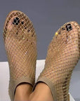 Black mesh shoes with rhinestone embellishments