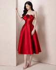 Red strapless dress with floral details