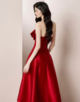 Red strapless dress with floral details