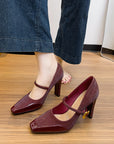 Maroon high-heeled Mary Jane sandals with a gold buckle