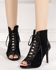 black lace up boots with high heels