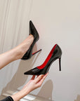 Christian Louboutin inspired black pumps with high heels and red soles