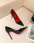 Christian Louboutin inspired black pumps with high heels and red soles