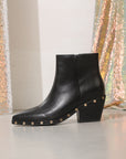 Black ankle boots with rivet studded details