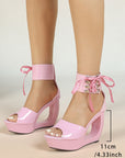 Patent hollow wedge platform heels with ribbon ankle cuff for women by VÈRV.