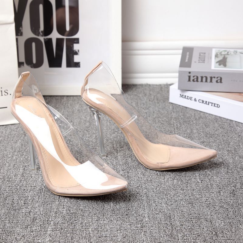 Nude pointed-toe stiletto heels with clear transparent side panels and clear heel