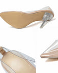 Nude pointed-toe stiletto heels with clear transparent side panels and clear heel