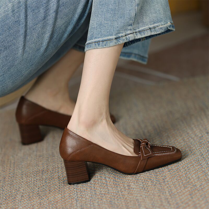 Brown loafers with brown heels 