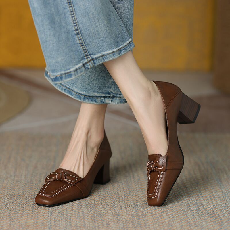 Brown loafers with brown heels 