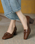 Brown loafers with brown heels 