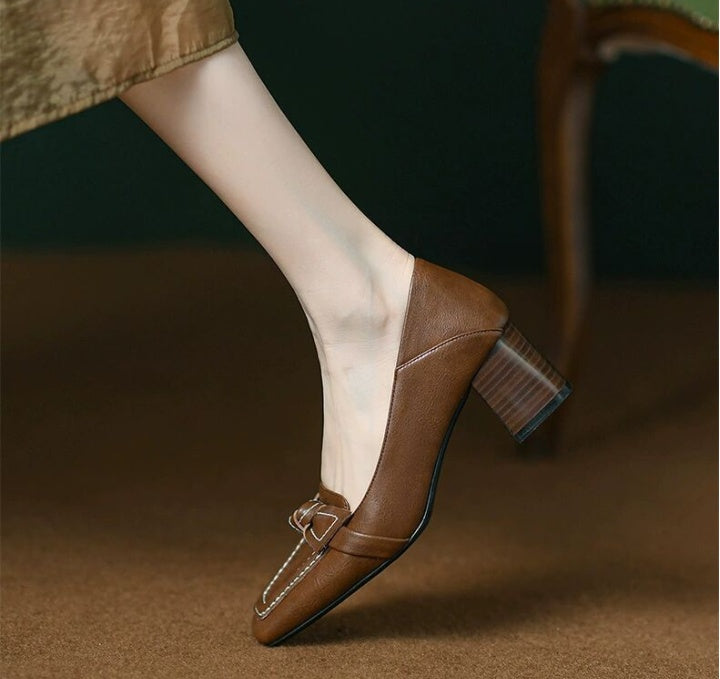 Brown loafers with brown heels 