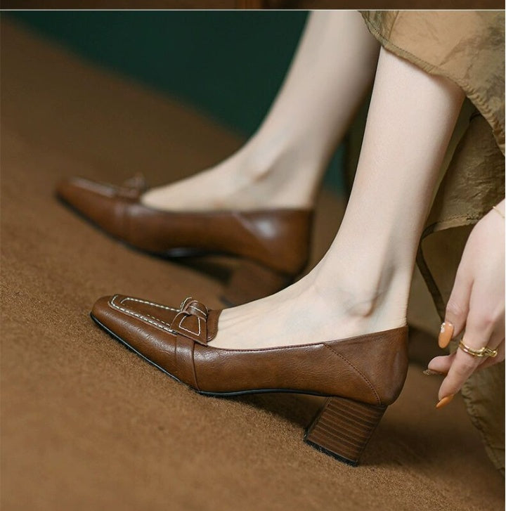 Brown loafers with brown heels 