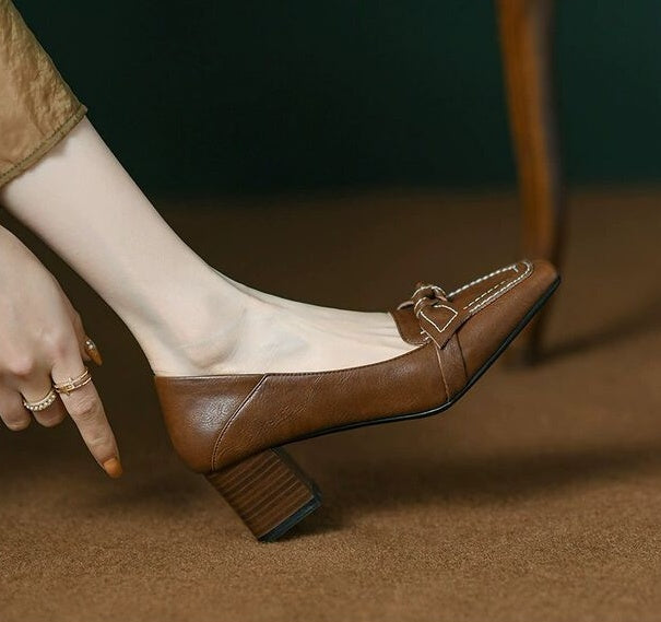Brown loafers with brown heels 