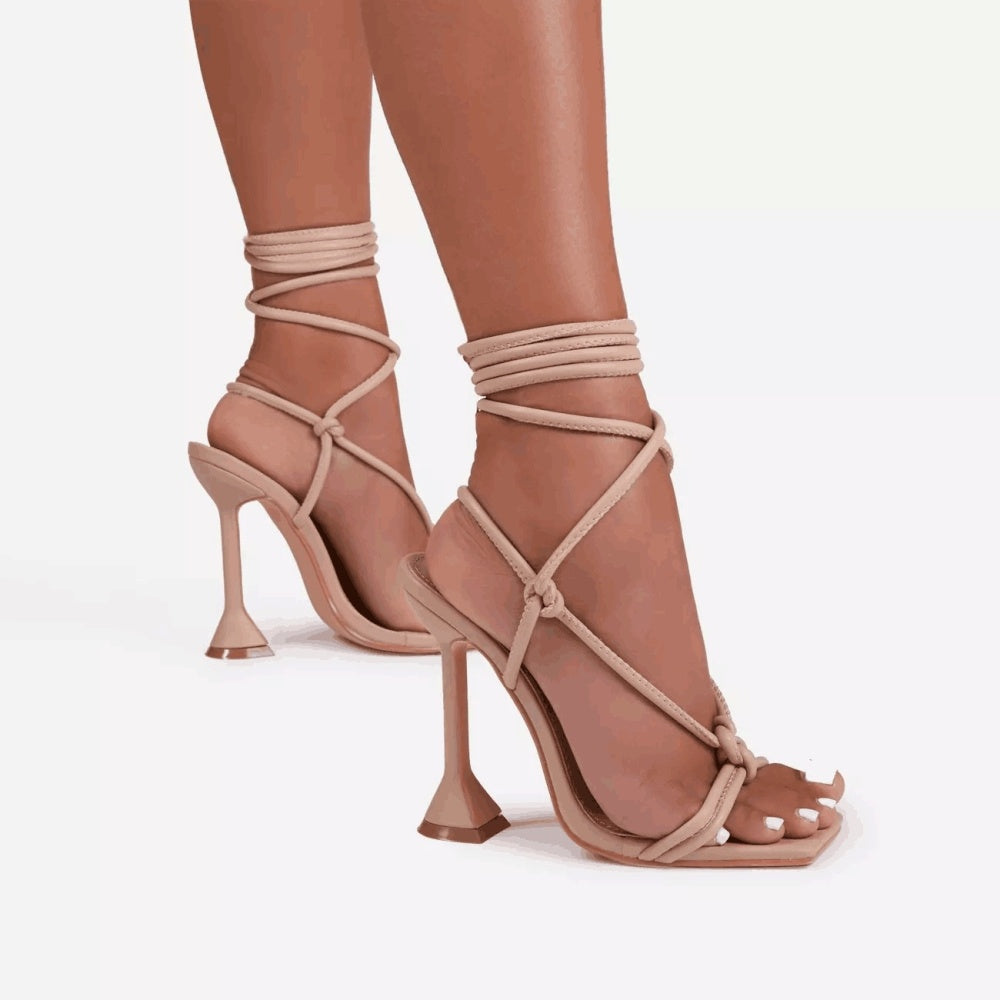 Tan strappy high-heeled sandals