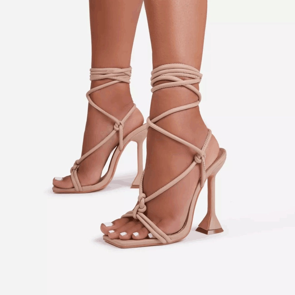 Tan strappy high-heeled sandals