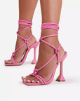 Pink strappy high-heeled sandals