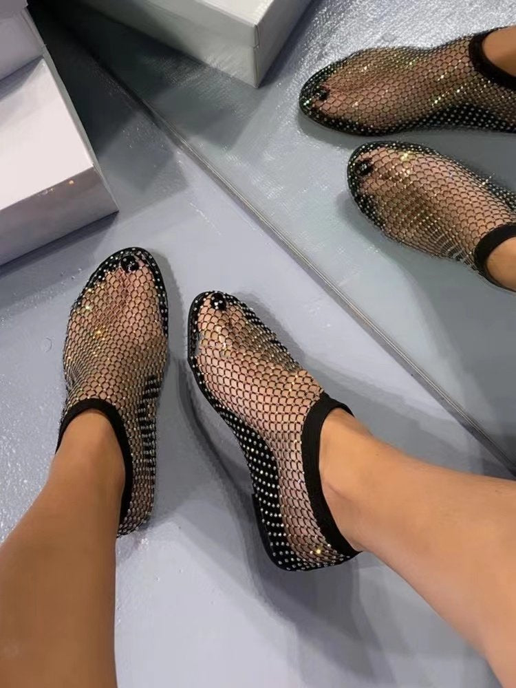 Black mesh shoes with rhinestone embellishments 