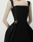 Black dress with bow details 