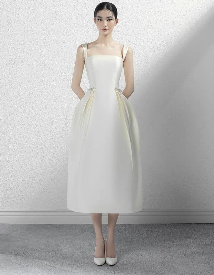 White dress with bow details 