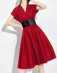 Red dress with a black belt 
