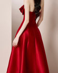 Red strapless dress with floral details 