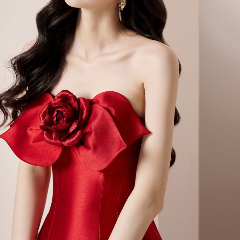 Red strapless dress with floral details 