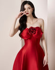 Red strapless dress with floral details 