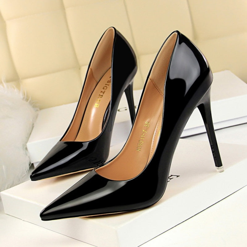 Sleek glossy pumps with a polished finish and classic pointed silhouette. Perfect for office chic, formal events, or evening elegance. Available in sizes 34–43. Step into shine and sophistication—shop now!
