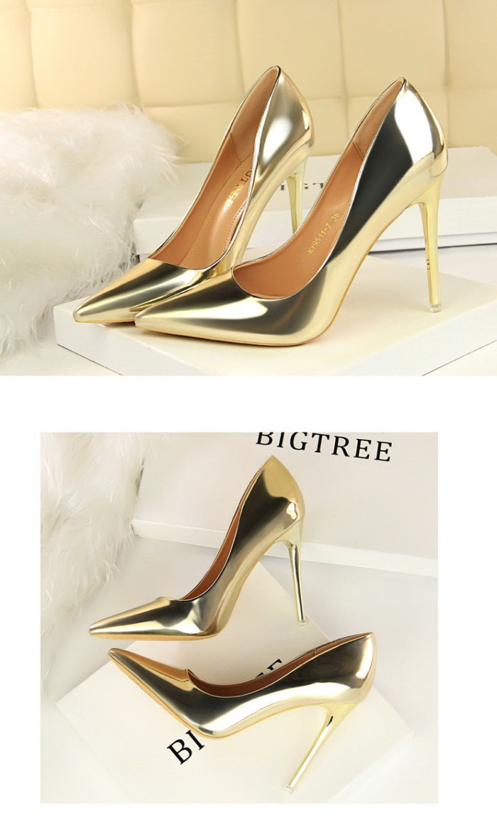 Sleek glossy pumps with a polished finish and classic pointed silhouette. Perfect for office chic, formal events, or evening elegance. Available in sizes 34–43. Step into shine and sophistication—shop now!