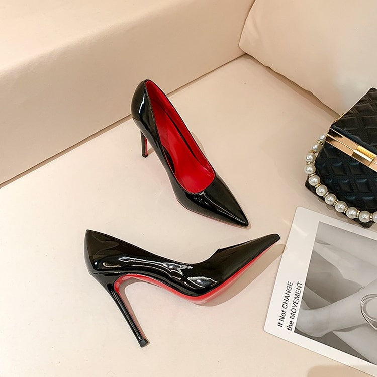 Christian Louboutin inspired black pumps with high heels and red soles
