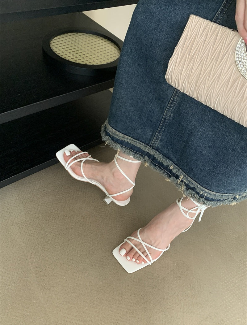 Lace up open kitten heels