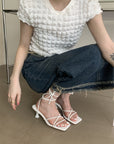 Lace up open kitten heels