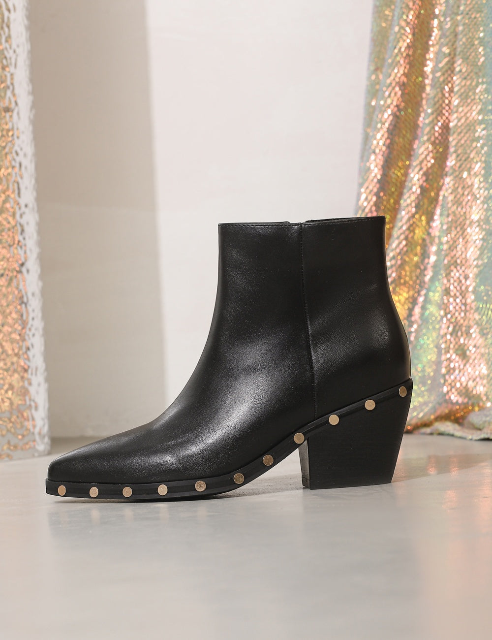 Black ankle boots with rivet studded details