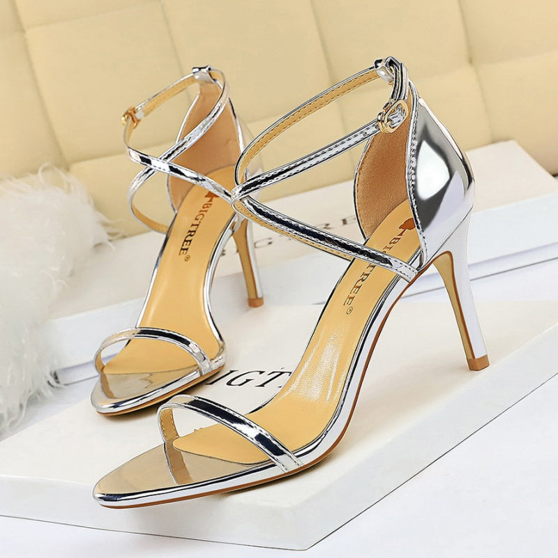 Elegant open-toe stiletto heels with a sleek silhouette and refined finish. Perfect for parties, weddings, or glamorous evenings out. Available in sizes 34–43. Elevate every step with timeless allure—shop now!