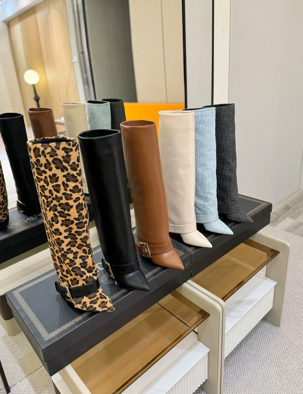 Black Givenchy Style knee-high boot with a gold buckle