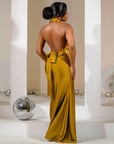 black evening backless gown with pearl accents, plunged neck