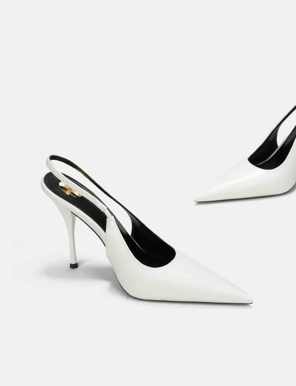 Luxe pointed slingback heels with a sleek high-heel silhouette and refined designer-inspired appeal. Perfect for power dressing, evening events, or statement styling. Available in sizes 34–43. Step into iconic sophistication—shop now!