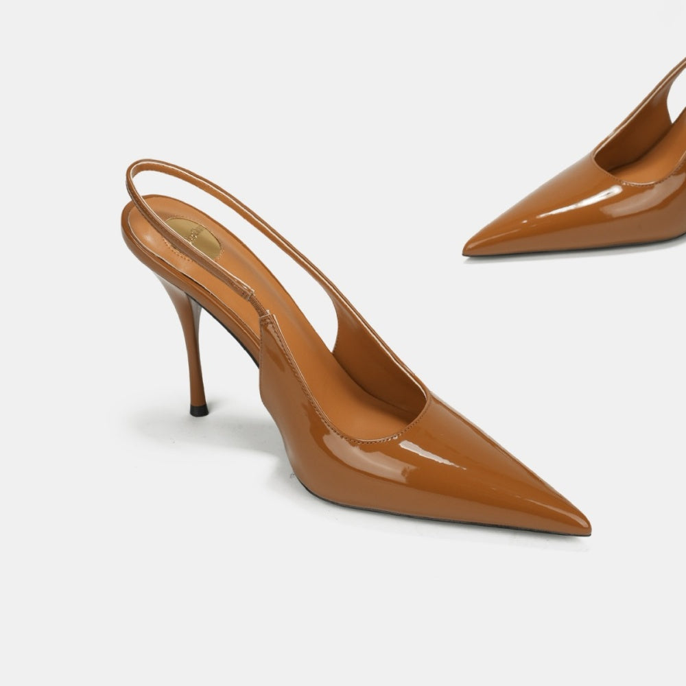 Luxe pointed slingback heels with a sleek high-heel silhouette and refined designer-inspired appeal. Perfect for power dressing, evening events, or statement styling. Available in sizes 34–43. Step into iconic sophistication—shop now!