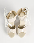 Patent hollow wedge platform heels with ribbon ankle cuff for women by VÈRV.