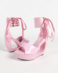 Patent hollow wedge platform heels with ribbon ankle cuff for women by VÈRV.